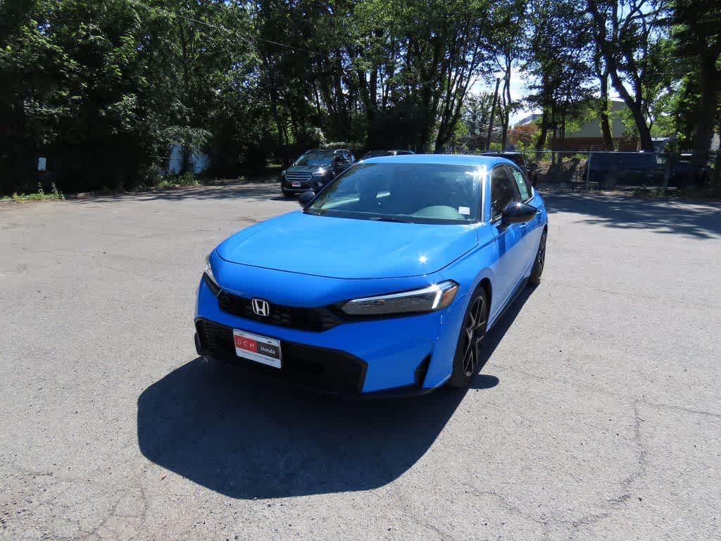 2026 Honda Civic Hatchback Sport in Boost Blue Pearl — front three-quarter view