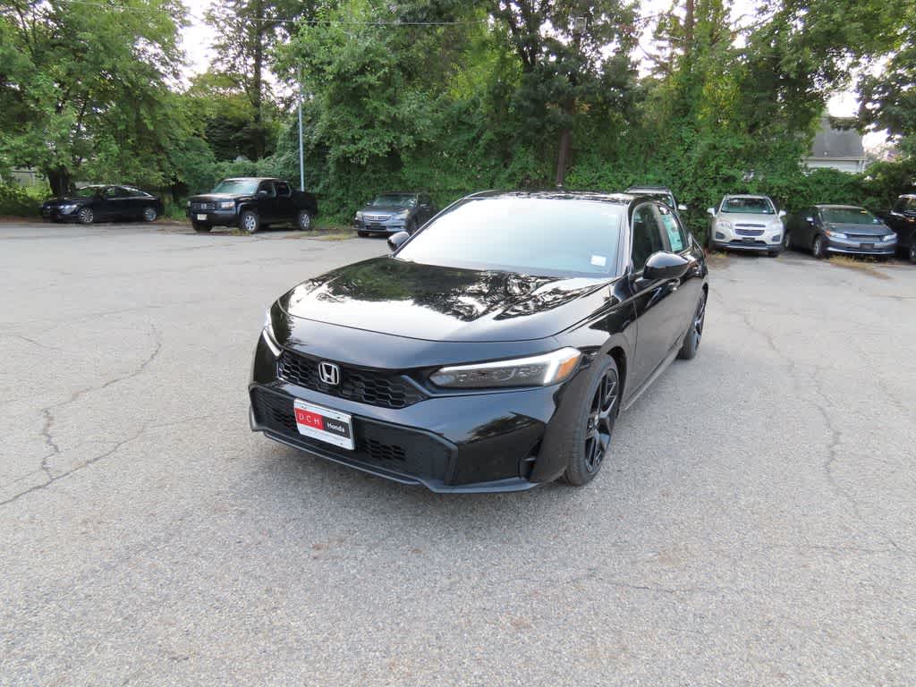 2026 Honda Civic Hatchback Sport in Crystal Black Pearl — front three-quarter view
