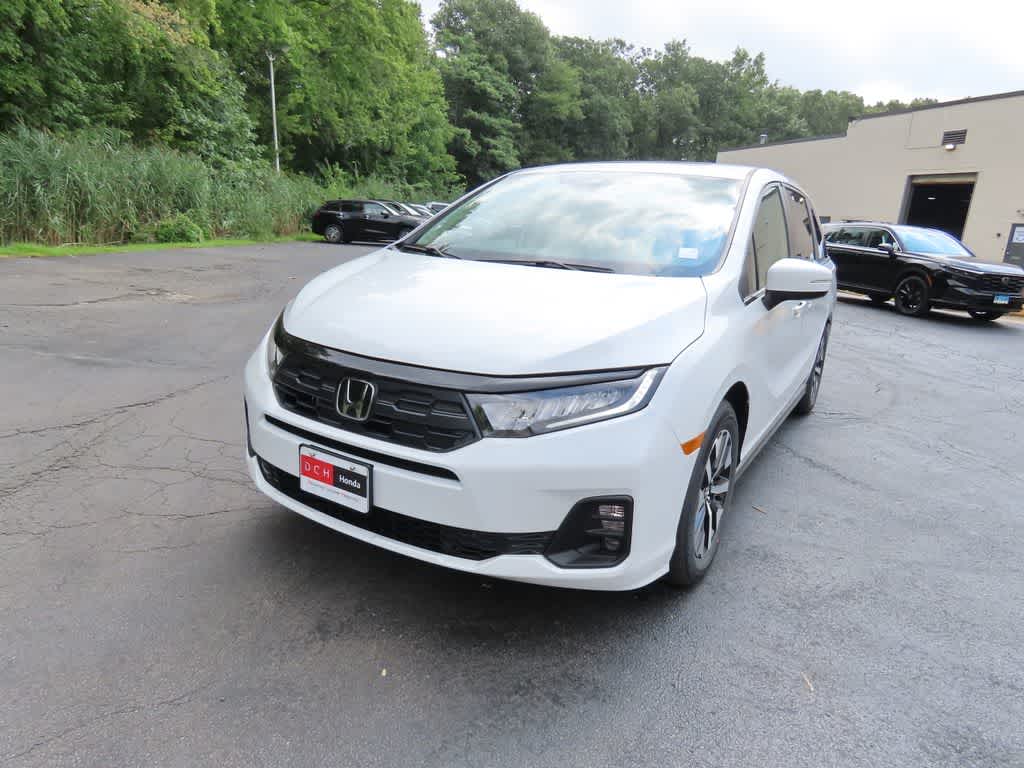 2026 Honda Odyssey EX-L in Platinum White Pearl — front three-quarter view