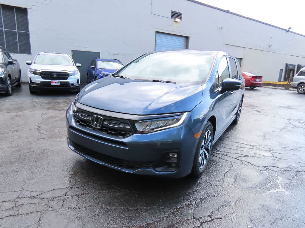 2026 Honda Odyssey EX-L in Smoke Blue Pearl — front three-quarter view