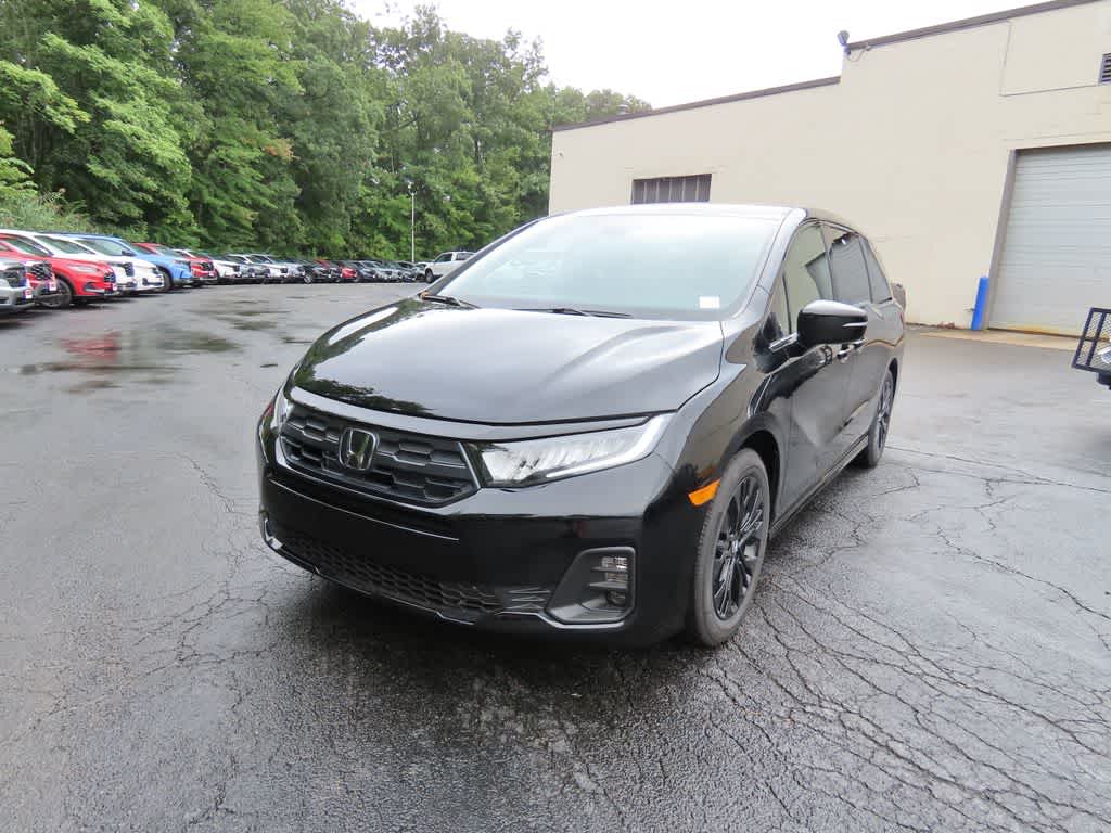 2026 Honda Odyssey Sport-L in Crystal Black Pearl — front three-quarter view