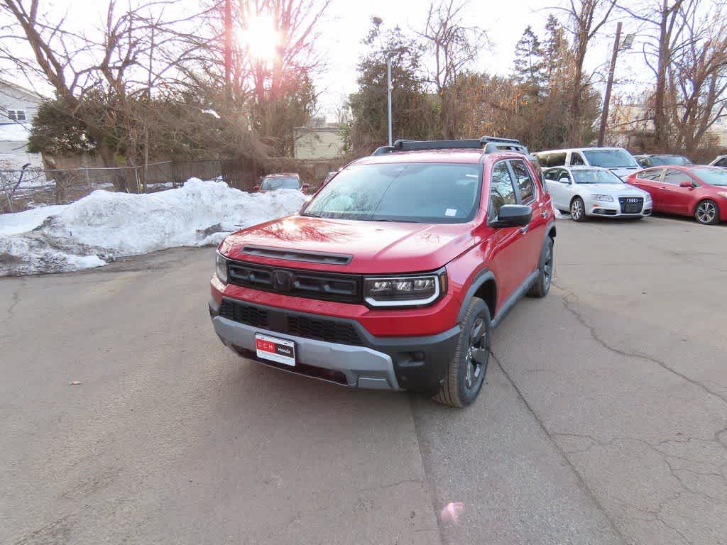 2026 Honda Passport RTL in Radiant Red Metallic II — front three-quarter view