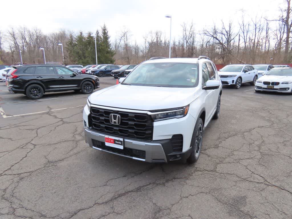 2026 Honda Pilot Touring S in Platinum White Pearl — front three-quarter view