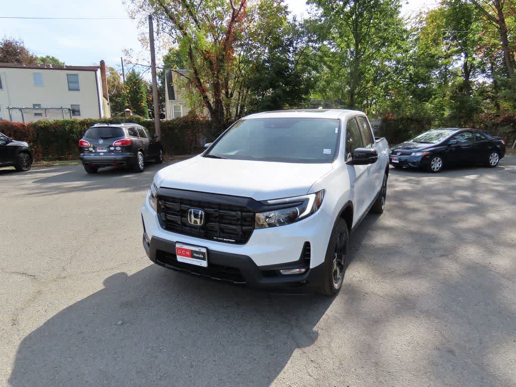 2026 Honda Ridgeline Black Edition in Platinum White Pearl — front three-quarter view